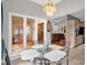 Bright dining area with a decorative chandelier and an open floorplan at 235 Pebble Point Rd, Salisbury, NC 28146
