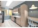 Bright kitchen with sleek appliances, tiled flooring, and eat-in breakfast area at 235 Pebble Point Rd, Salisbury, NC 28146