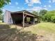 Covered barn area with room for equipment storage and protection from the elements at 2500 Cedar Cove Dr, Harrisburg, NC 28075