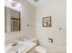 Bathroom features a neutral vanity and tile floors at 2500 Cedar Cove Dr, Harrisburg, NC 28075
