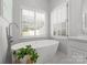 A well-lit soaking tub is situated in front of a shuttered window, with sleek fixtures and modern lines at 328 Whippoorwill Rd, Mooresville, NC 28117