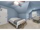 Bedroom featuring pitched ceilings, a modern ceiling fan, neutral paint, and carpeted floors at 328 Whippoorwill Rd, Mooresville, NC 28117