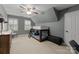 A bedroom with a bunk bed under the window and plenty of natural light at 328 Whippoorwill Rd, Mooresville, NC 28117