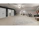 Expansive bonus room with a ceiling fan and ample space for various activities at 328 Whippoorwill Rd, Mooresville, NC 28117