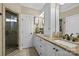 Elegant bathroom featuring double vanities, granite counters, and a luxurious tiled glass shower at 335 Wintergreen Ct, Kings Mountain, NC 28086