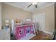 Bright ' bedroom with hardwood floors, playful decor, and bunk bed with playhouse feature at 335 Wintergreen Ct, Kings Mountain, NC 28086