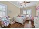 Bright bedroom with hardwood floors, natural light, and a cozy, inviting atmosphere at 335 Wintergreen Ct, Kings Mountain, NC 28086