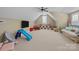 Spacious bonus room is perfect for a playroom, media room, or additional living area at 335 Wintergreen Ct, Kings Mountain, NC 28086