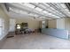 Spacious garage with high ceilings and plenty of room for parking and storage at 335 Wintergreen Ct, Kings Mountain, NC 28086