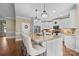 Gourmet kitchen featuring a large island with seating, stainless steel appliances, and modern finishes at 335 Wintergreen Ct, Kings Mountain, NC 28086