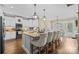 Beautiful kitchen with white cabinetry, granite countertops, a central island, and pendant lighting at 335 Wintergreen Ct, Kings Mountain, NC 28086