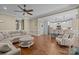 Open-concept living room showcasing hardwood floors, and a clear view into the kitchen at 335 Wintergreen Ct, Kings Mountain, NC 28086