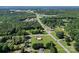 Stunning aerial view of a home surrounded by green trees in a rural neighborhood at 35 Telephone Exchange Rd, Hickory, NC 28601