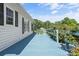 Spacious outdoor deck perfect for entertaining, featuring fresh paint, beautiful flowers and room for seating at 35 Telephone Exchange Rd, Hickory, NC 28601