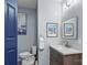 Bathroom featuring vanity, toilet, modern fixtures, clean lines, a neutral color palette, and stylish decor at 35 Telephone Exchange Rd, Hickory, NC 28601