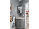 Cozy bathroom features a stylish gray vanity with granite countertop and modern fixtures at 35 Telephone Exchange Rd, Hickory, NC 28601