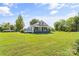 Inviting home showcasing a cozy front porch and a spacious yard, ideal for outdoor activities and relaxation at 35 Telephone Exchange Rd, Hickory, NC 28601