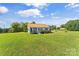 Charming single-story home with a large yard and a new metal roof, complemented by colorful landscaping at 35 Telephone Exchange Rd, Hickory, NC 28601
