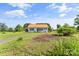 Charming cottage-style home with a new metal roof, fresh exterior paint, and a well-manicured lawn at 35 Telephone Exchange Rd, Hickory, NC 28601
