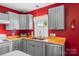 Gray cabinets with wood countertops and stainless steel dishwasher at 35 Telephone Exchange Rd, Hickory, NC 28601
