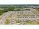 Expansive aerial view of a residential area bordered by lush green trees, offering a serene and picturesque setting at 3643 Slider Ter, Lancaster, SC 29720