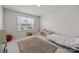 Bright, carpeted bedroom with a window and simple decor at 3643 Slider Ter, Lancaster, SC 29720
