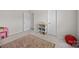 Neutral bedroom featuring a carpeted floor, two doors and playful decorative accents at 3643 Slider Ter, Lancaster, SC 29720