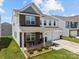 Attractive two-story home featuring a covered front porch and a two-car garage at 3643 Slider Ter, Lancaster, SC 29720