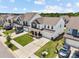 Aerial view of a neighborhood showcasing well-maintained lawns, driveways, and attractive two-story homes at 3643 Slider Ter, Lancaster, SC 29720