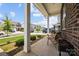 Inviting front porch with comfortable chairs, offering a relaxing outdoor space with views of the neighborhood at 3643 Slider Ter, Lancaster, SC 29720