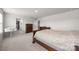Neutral main bedroom featuring carpet floors, walk-in closet, and wooden furniture at 3643 Slider Ter, Lancaster, SC 29720