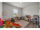 This playroom is well-lit and spacious with plenty of room for toys and activities at 3643 Slider Ter, Lancaster, SC 29720