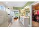 Bright, elegant Primary bathroom with dual sinks, glass shower, and walk-in closet at 3707 Seagrave Farm Rd, Concord, NC 28025