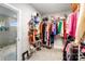 Walk-in closet showcasing ample shelving, storage, and easy access to the ensuite bathroom at 3707 Seagrave Farm Rd, Concord, NC 28025