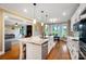 Spacious kitchen with marble countertops, a large island, and modern stainless steel appliances at 3707 Seagrave Farm Rd, Concord, NC 28025