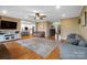 Spacious living room featuring hardwood floors, neutral tones and an open layout at 3707 Seagrave Farm Rd, Concord, NC 28025