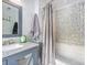 Modern bathroom featuring marble countertops, sleek fixtures, and decorative tile accents at 415 W 7Th St # F, Charlotte, NC 28202