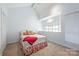 Bright bedroom with high ceilings and a comfy bed, perfect for relaxation at 415 W 7Th St # F, Charlotte, NC 28202
