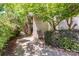 View of the exterior featuring a welcoming pathway and beautifully maintained landscaping at 415 W 7Th St # F, Charlotte, NC 28202