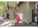 Exterior of home featuring steps with red painted railings to a private entrance at 415 W 7Th St # F, Charlotte, NC 28202