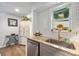 Bright kitchen with stainless steel appliances, granite countertops and subway tile backsplash at 415 W 7Th St # F, Charlotte, NC 28202