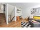 Living room featuring wood flooring, desk, and a comfortable seating area at 415 W 7Th St # F, Charlotte, NC 28202