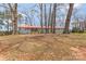 Charming one-story home with red roof and brick facade sitting on a grassy lot at 4566 Fork Rd, Norwood, NC 28128