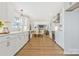 Open concept kitchen flows into dining and living spaces, perfect for entertaining and Gathering gatherings at 4566 Fork Rd, Norwood, NC 28128