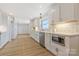 Spacious kitchen features stainless steel appliances, quartz countertops, and ample cabinet space at 4566 Fork Rd, Norwood, NC 28128