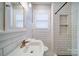Bathroom featuring white subway tile and updated fixtures at 501 Pee Dee Ave, Albemarle, NC 28001