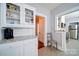 Charming kitchen with white cabinetry, granite countertops, and stainless steel appliances at 501 Pee Dee Ave, Albemarle, NC 28001
