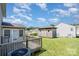 Well-maintained backyard with shed, deck, and sunny exposure, creating an inviting outdoor living space at 5141 Grays Ridge Dr, Charlotte, NC 28269