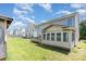 Backyard with deck and sunroom at 5141 Grays Ridge Dr, Charlotte, NC 28269