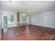 Spacious bedroom features a large closet, wood floors, and a ceiling light at 5141 Grays Ridge Dr, Charlotte, NC 28269